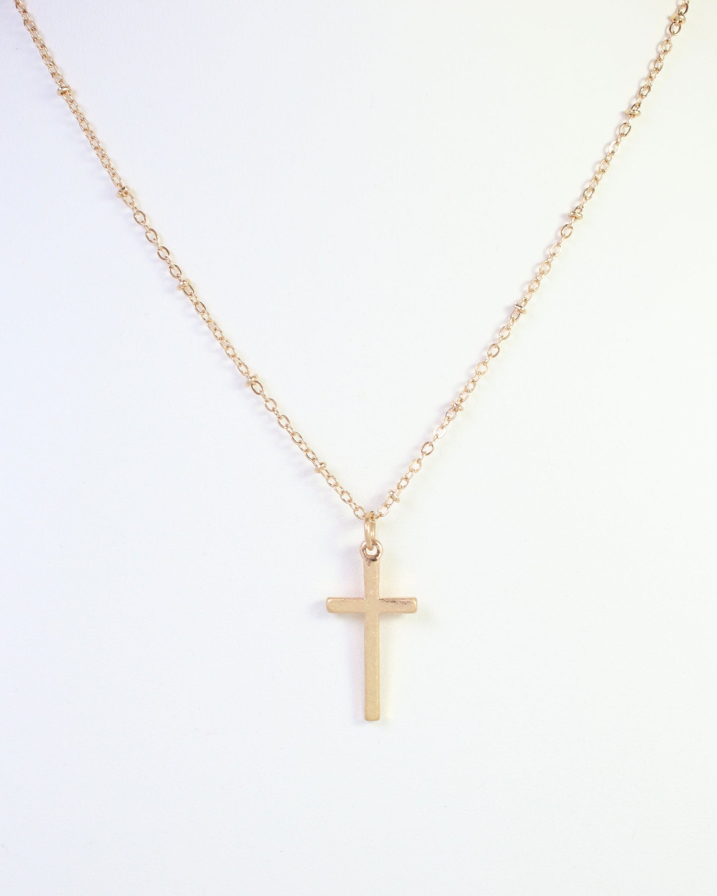 Cassandra Cross Necklace Worn Gold