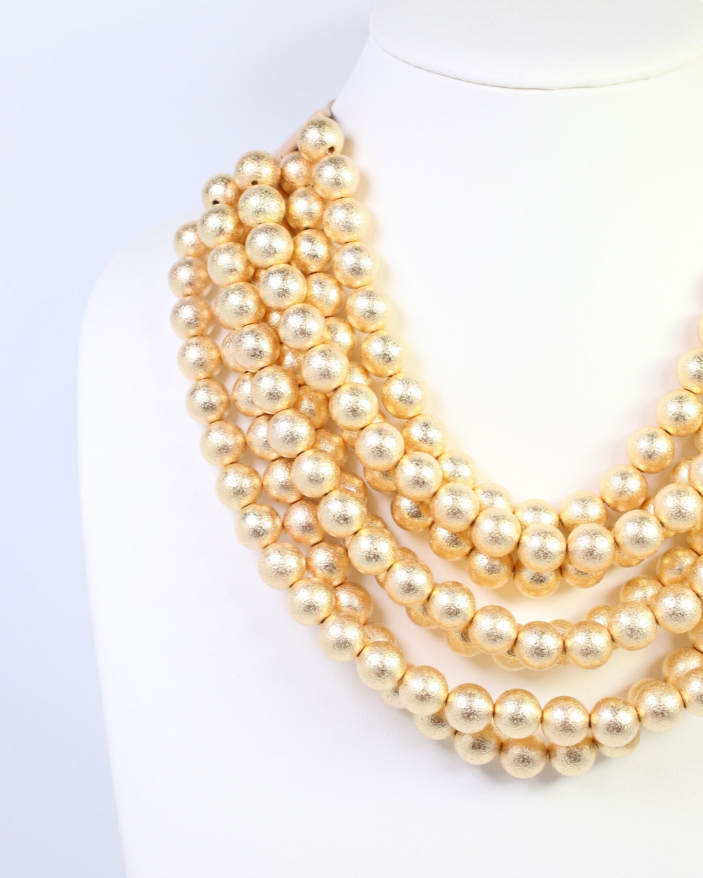 Kimbrel Multi Layered Smooth Beaded Necklace Matte Gold