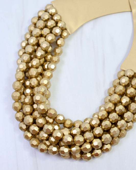 Cadence Multi Layered Beaded Necklace Worn Gold
