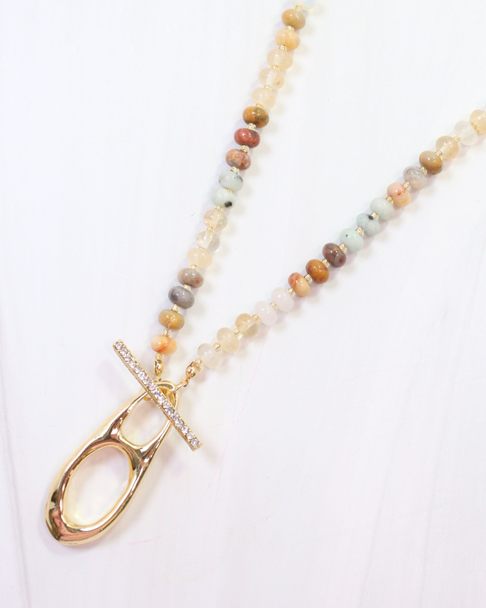 Rives Stone and Crystal Pendant Necklace Natural – Caroline Hill Wholesale