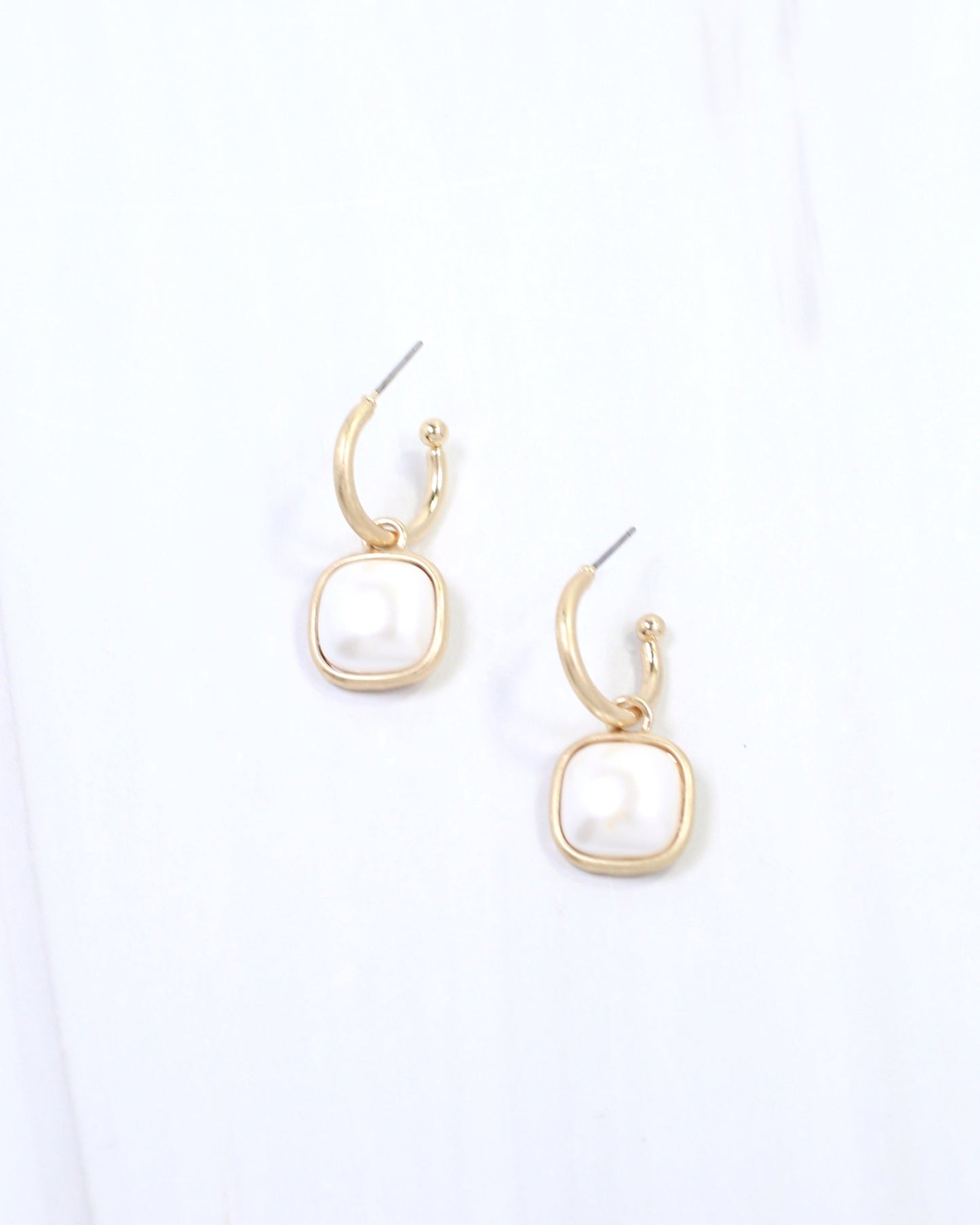 April Pearl Dangle Huggie Hoop Earring Worn Gold