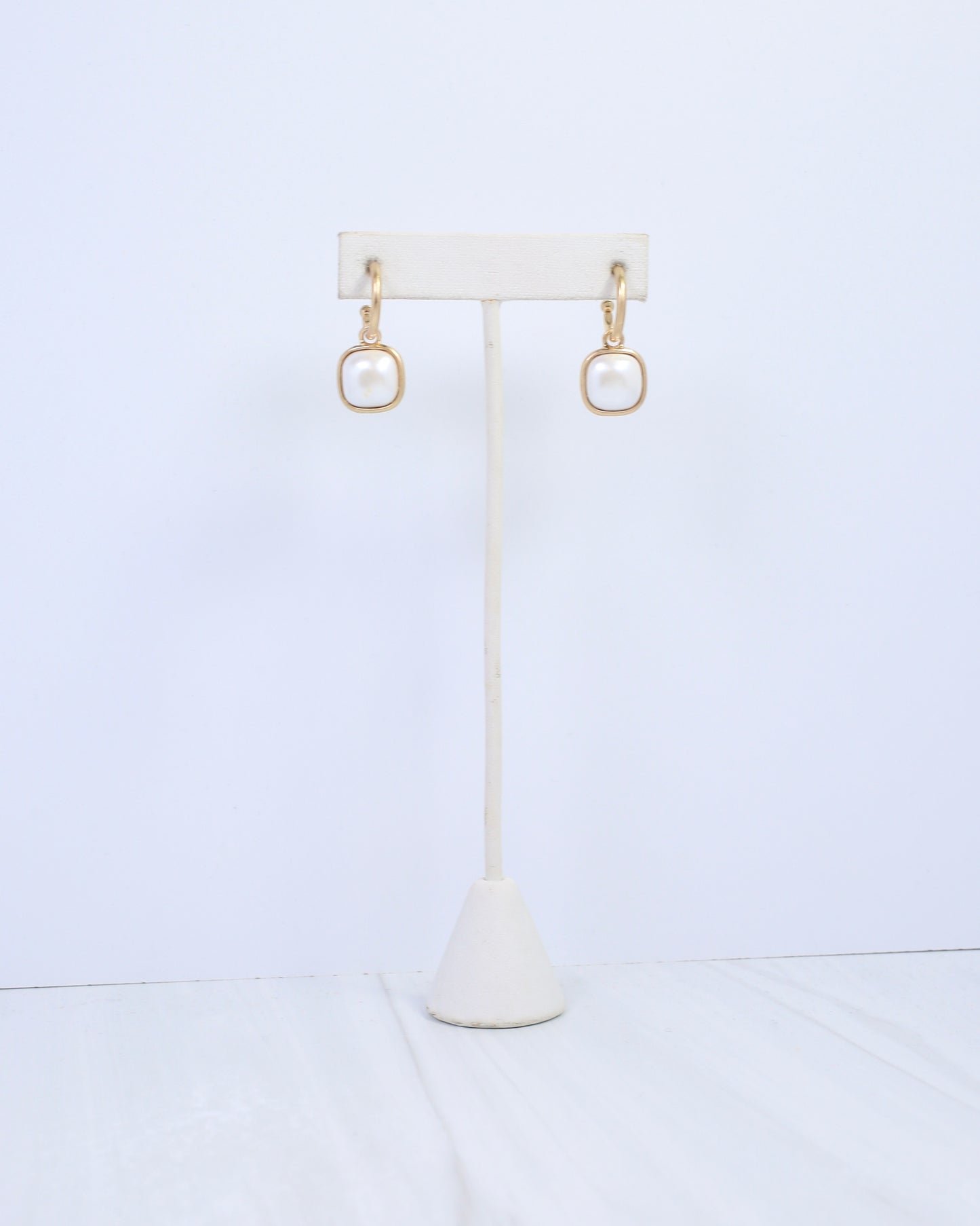 April Pearl Dangle Huggie Hoop Earring Worn Gold