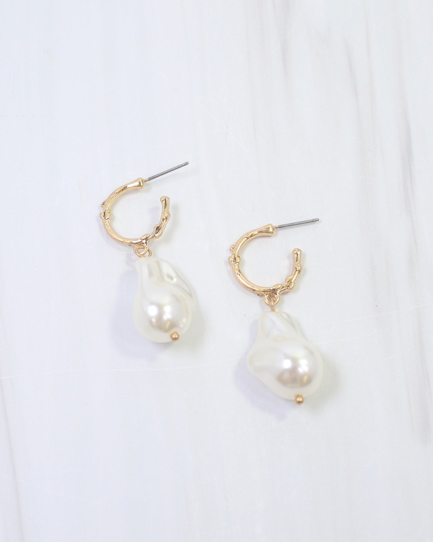 Bernice Pearl Huggie Hoop Earring Worn Gold