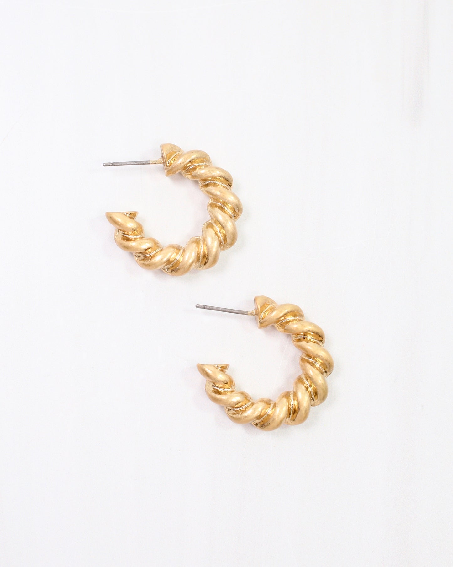 Raymonde  Small Twisted Hoop Earring Worn Gold
