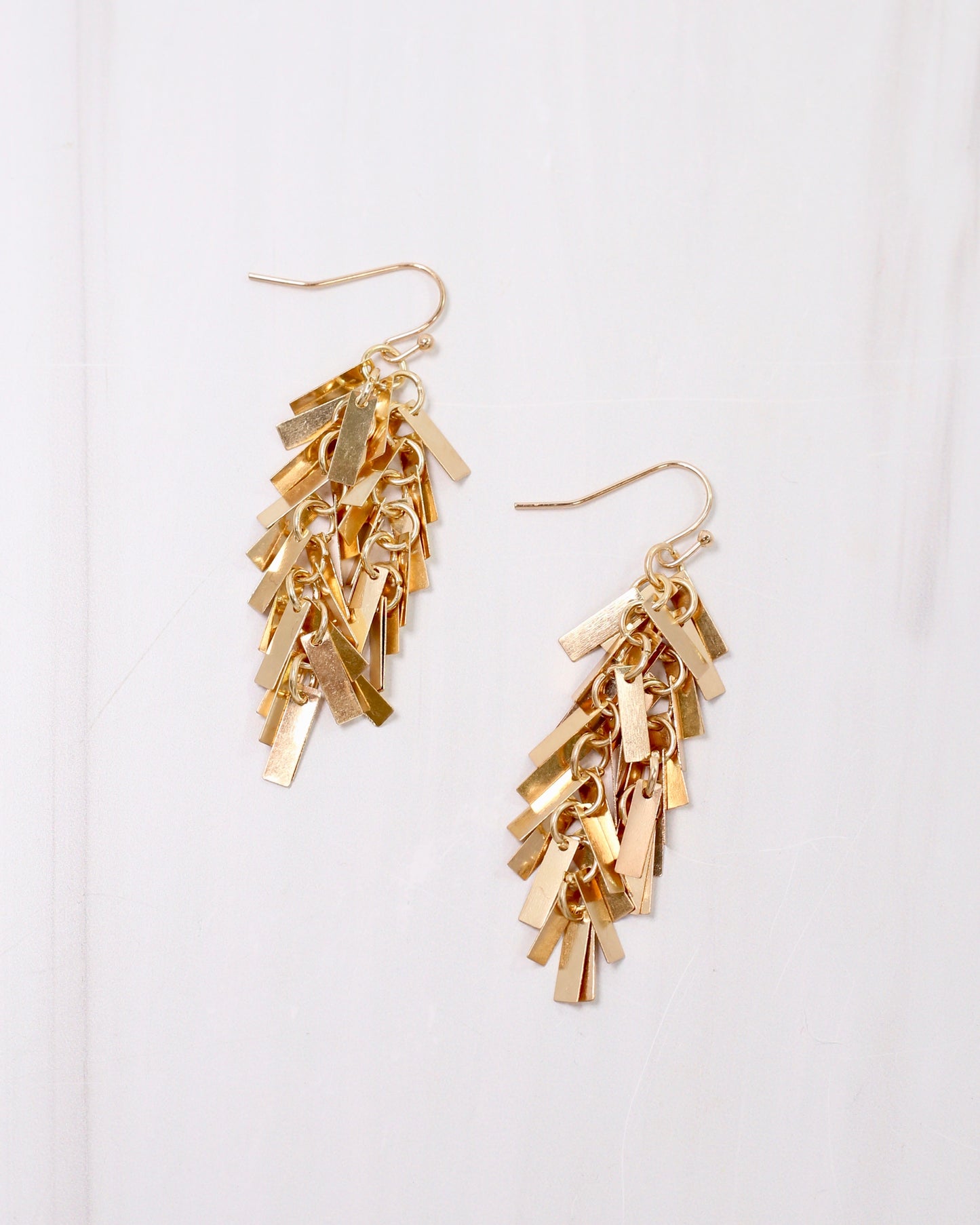 Goldie Metal Fringe Earring Worn Gold