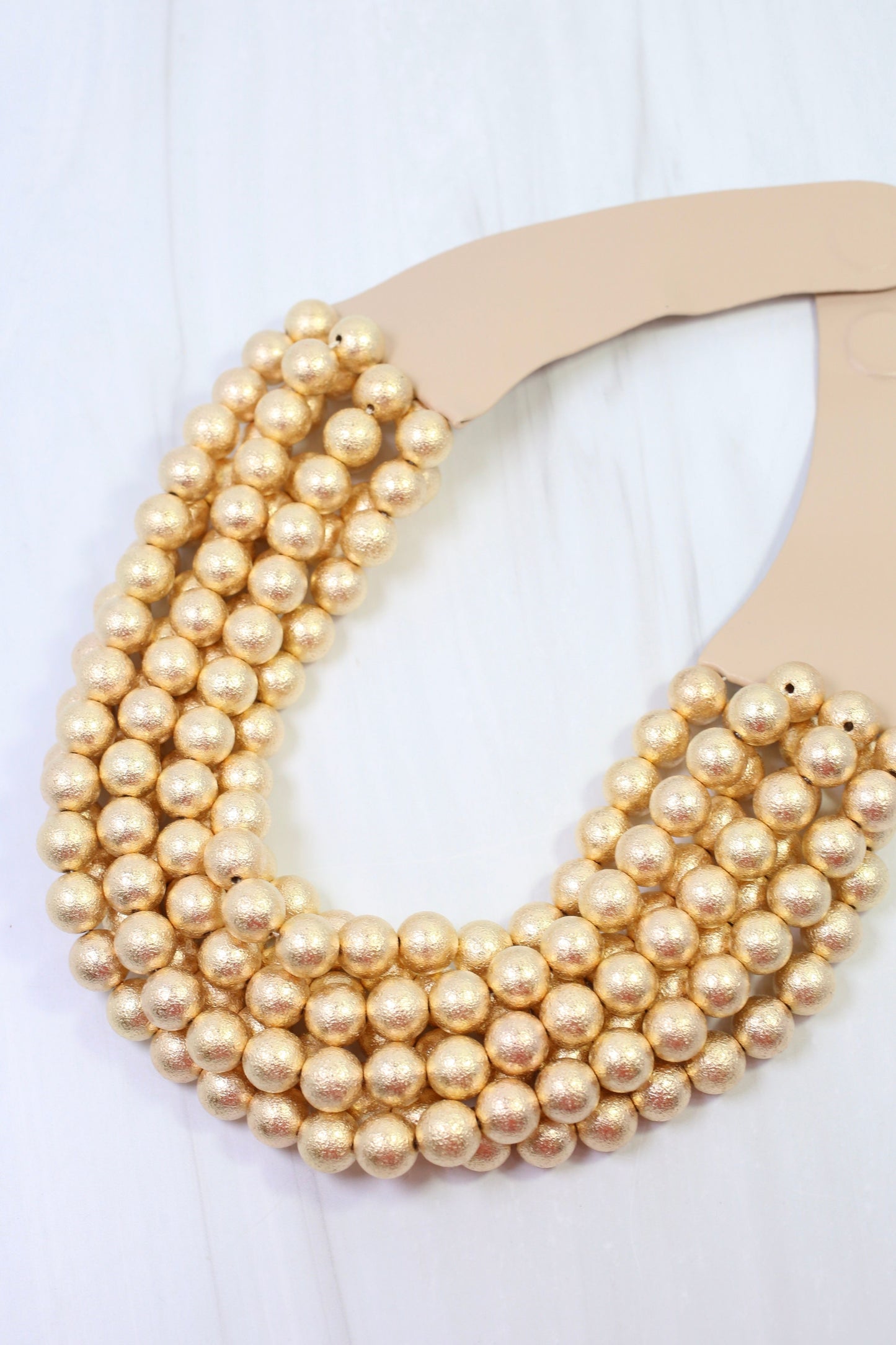 Kimbrel Multi Layered Smooth Beaded Necklace Matte Gold
