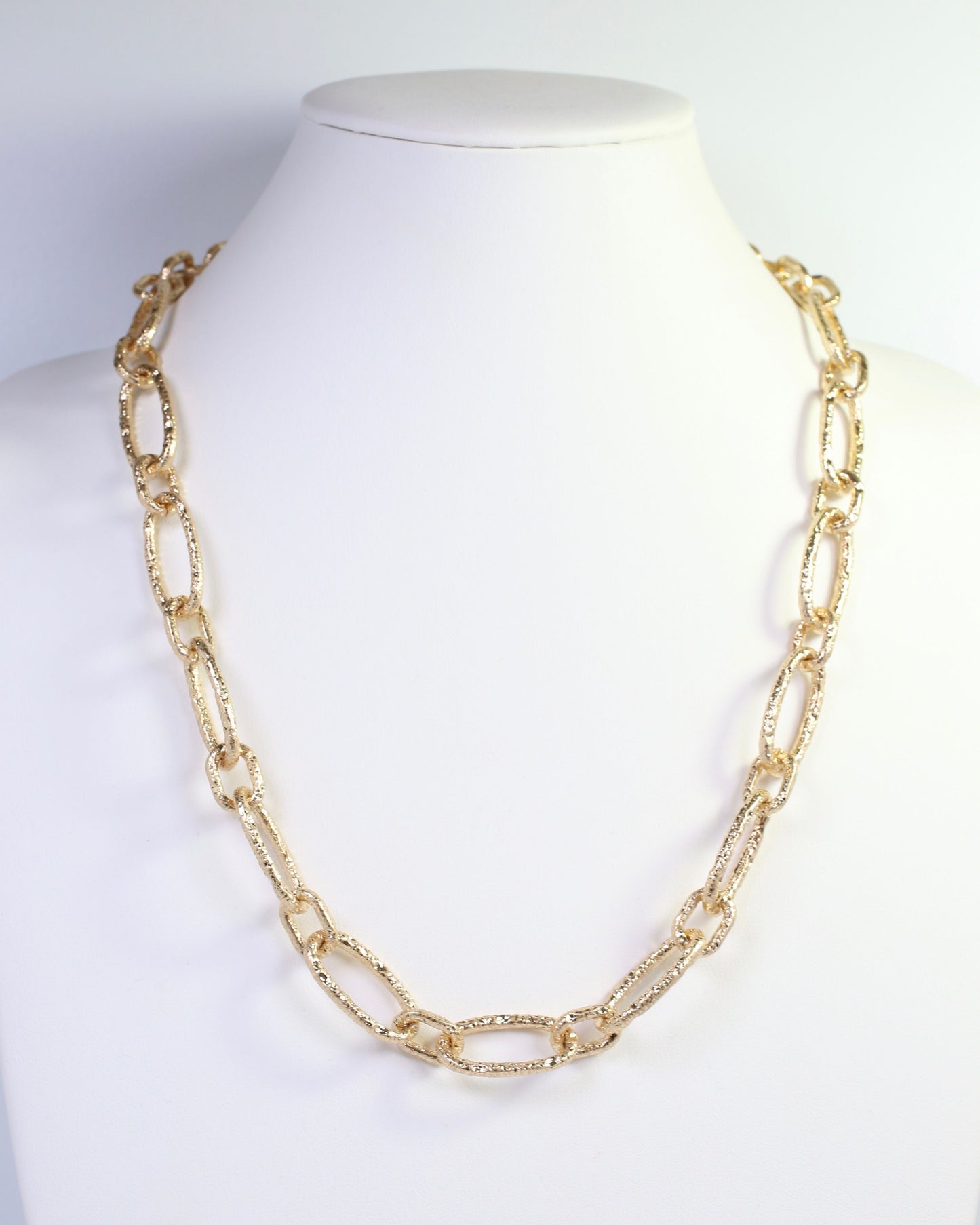 Aleah Hammered Oval Link Necklace Worn Gold