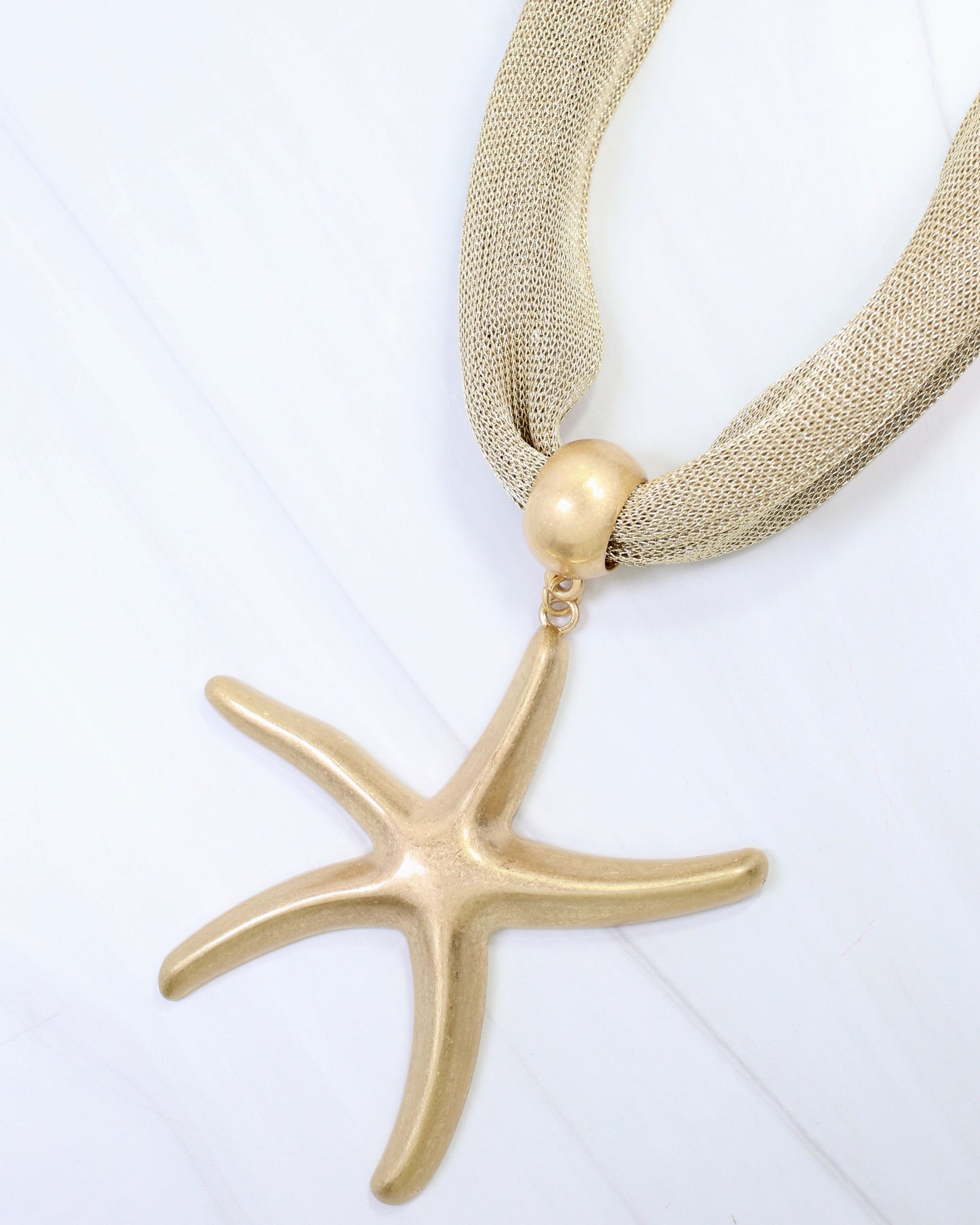 Maitland Mesh Starfish Necklace Worn Gold