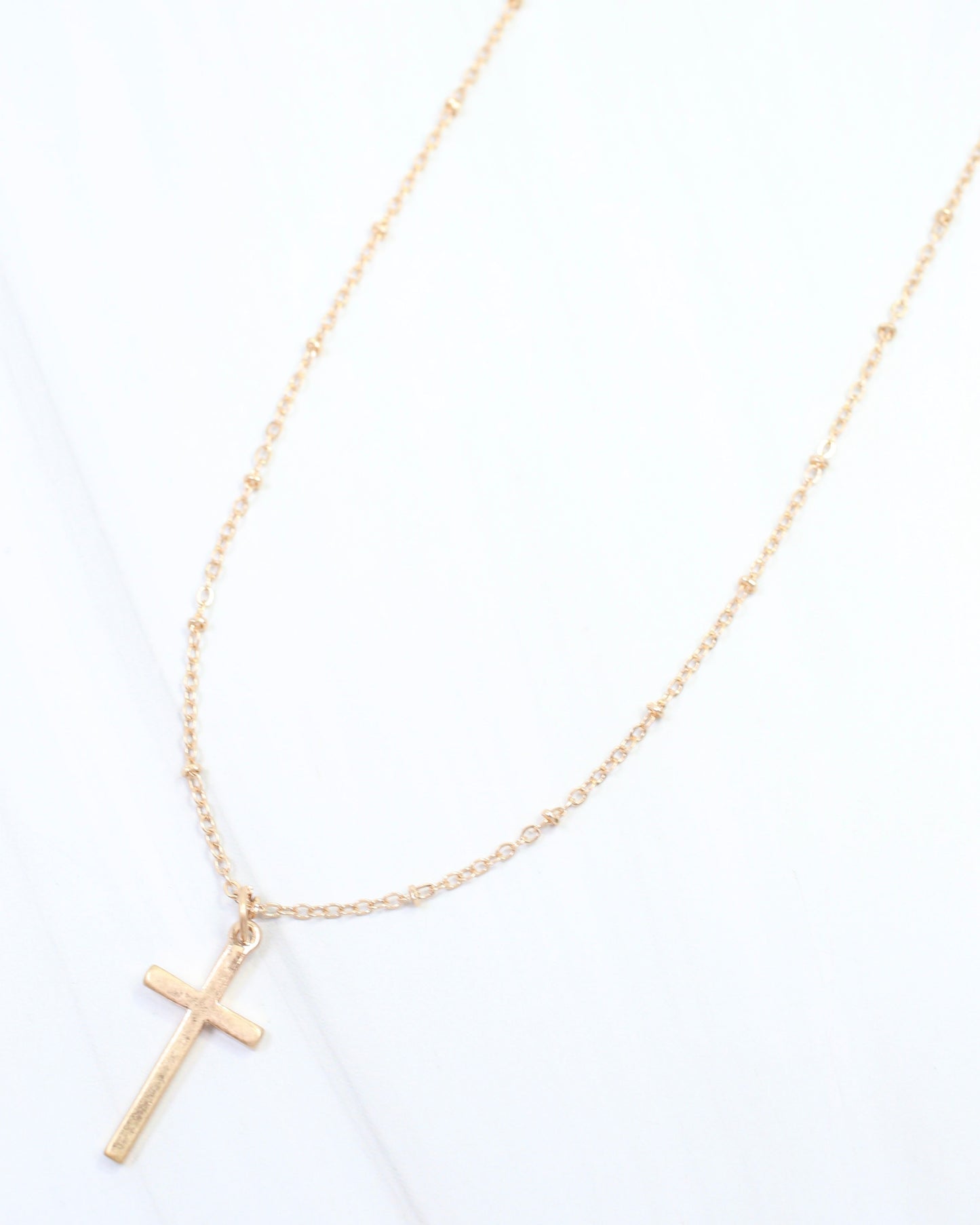 Cassandra Cross Necklace Worn Gold